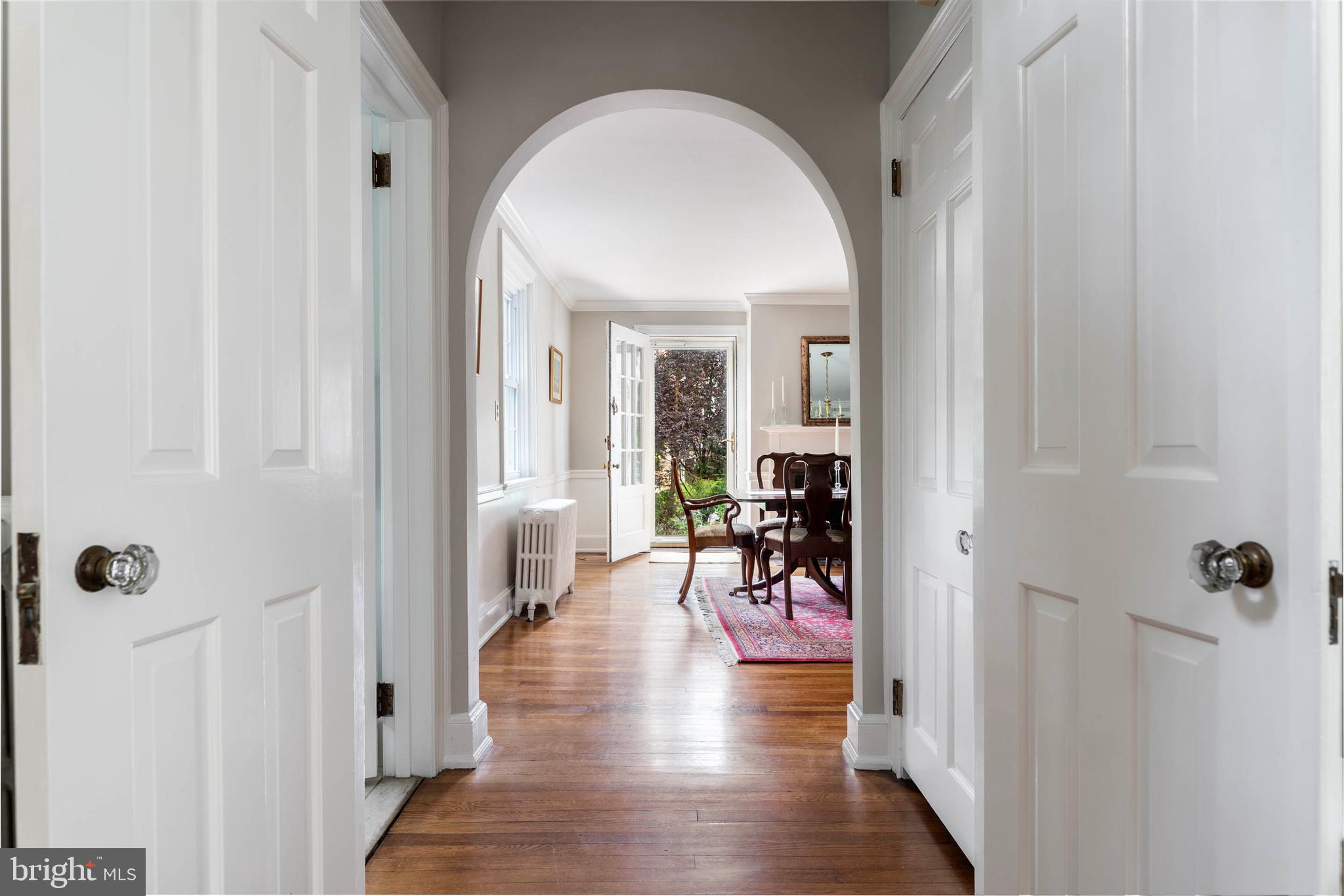 795 Harrison Road Villanova, PA 19085 - Photo 10 of 55 Arched Hallway to Dining Room