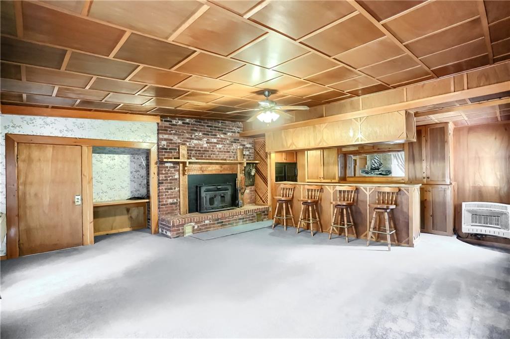 6 Quarry Road Sewickley, PA 15143 - Photo 4 of 22 20 X 24 FAMILY ROOM WITH A BUILT IN BAR, SAFE AND BUCKSTOVE.