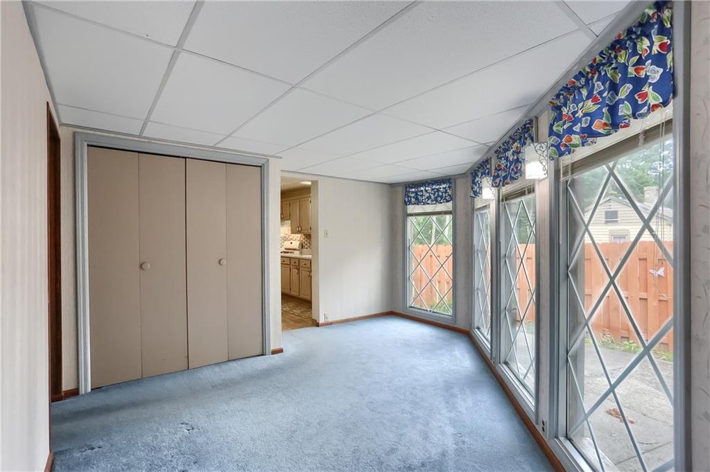 6 Quarry Road Sewickley, PA 15143 - Photo 7 of 22 LIGHT AND BRIGHT ROOM LOCATED BETWEEN KITCHEN AND FAMILY ROOM