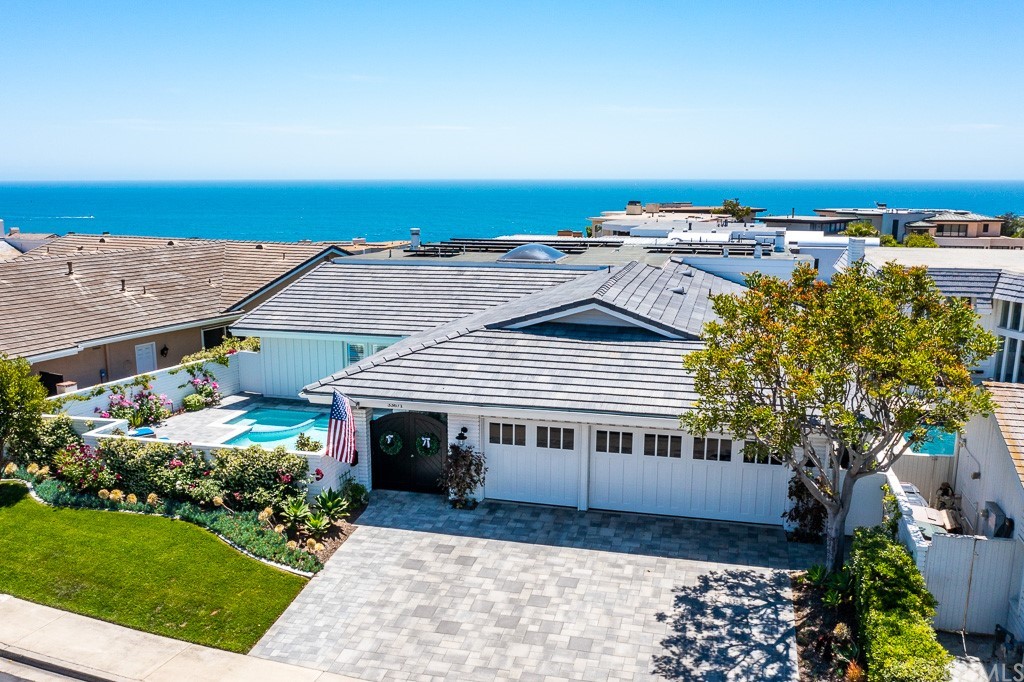 Welcome to Niguel Shores and this lovely home set in picture frame of Blue Pacific Ocean.