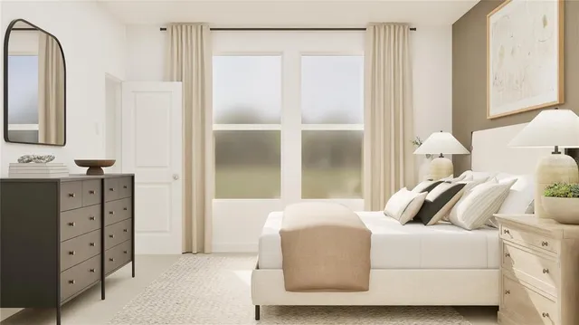 a bedroom with a bed and with furniture