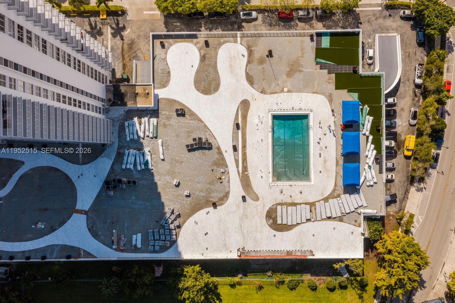 231 174th Street, Unit 2018 Sunny Isles Beach, FL 33160 - Photo 25 of 25 an aerial view of a fireplace with table and chairs