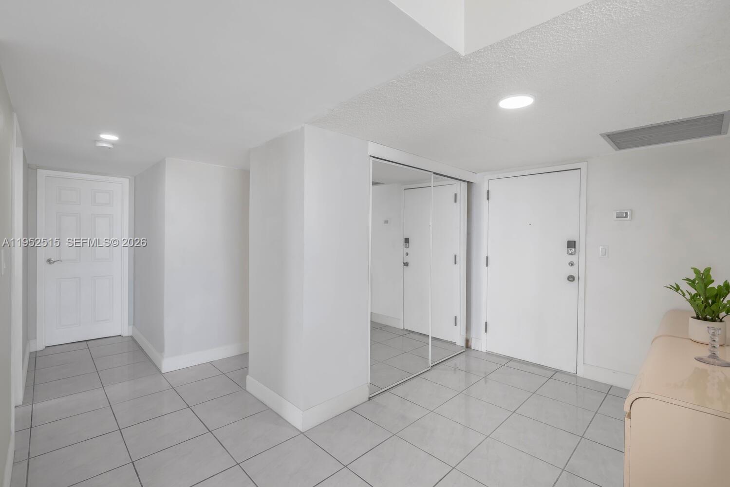 231 174th Street, Unit 2018 Sunny Isles Beach, FL 33160 - Photo 4 of 25 a view of an empty room