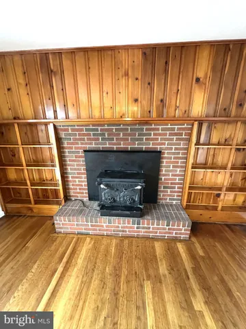 a living room with a fireplace