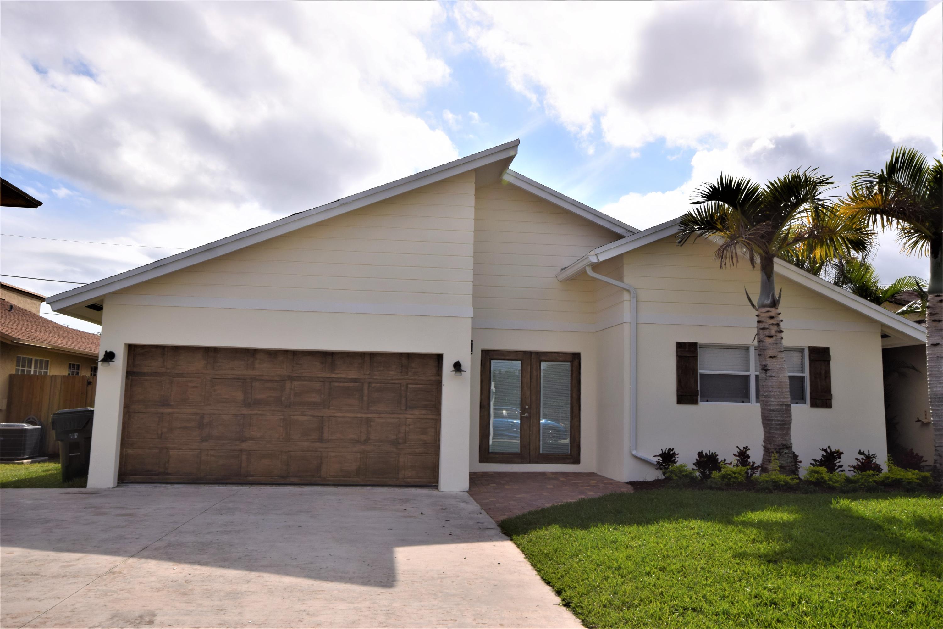 516 Northwest 55th Terrace Boca Raton, FL 33487 - Photo 1 of 39 DSC_4417