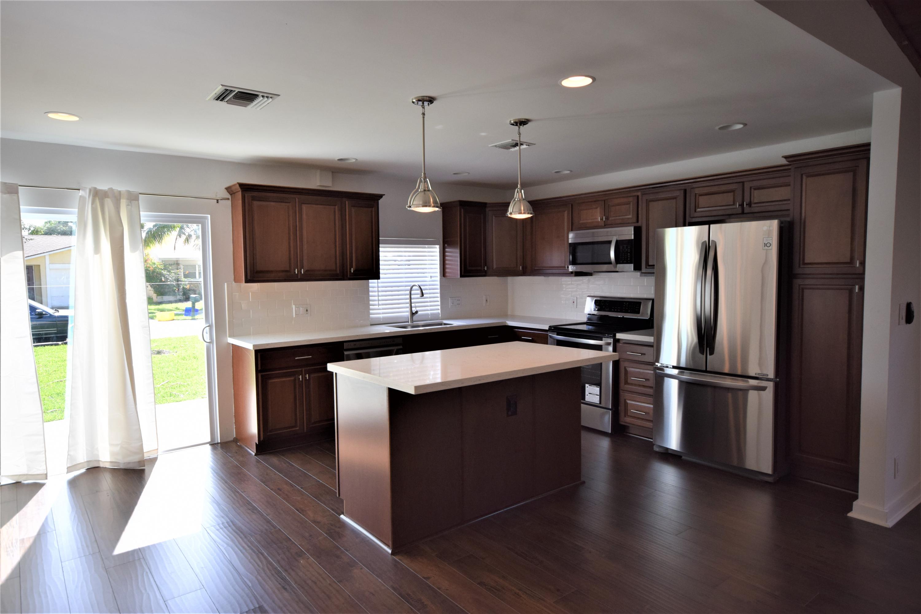 516 Northwest 55th Terrace Boca Raton, FL 33487 - Photo 2 of 39 DSC_4363