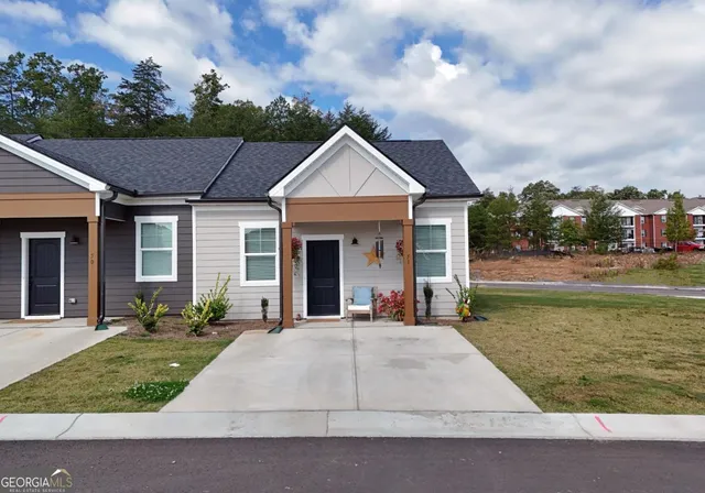 a view of a house with garden