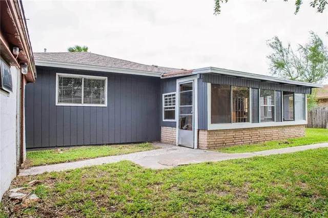 a view of a livingroom with furniture and a window