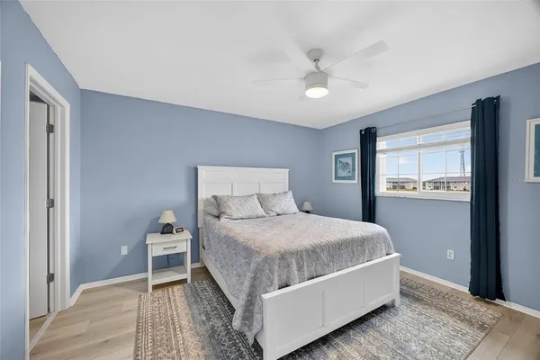 a bedroom with a bed and a cabinets