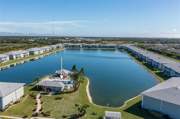 a view of a lake with couches