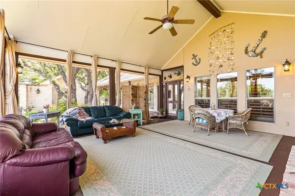 a living room filled with furniture