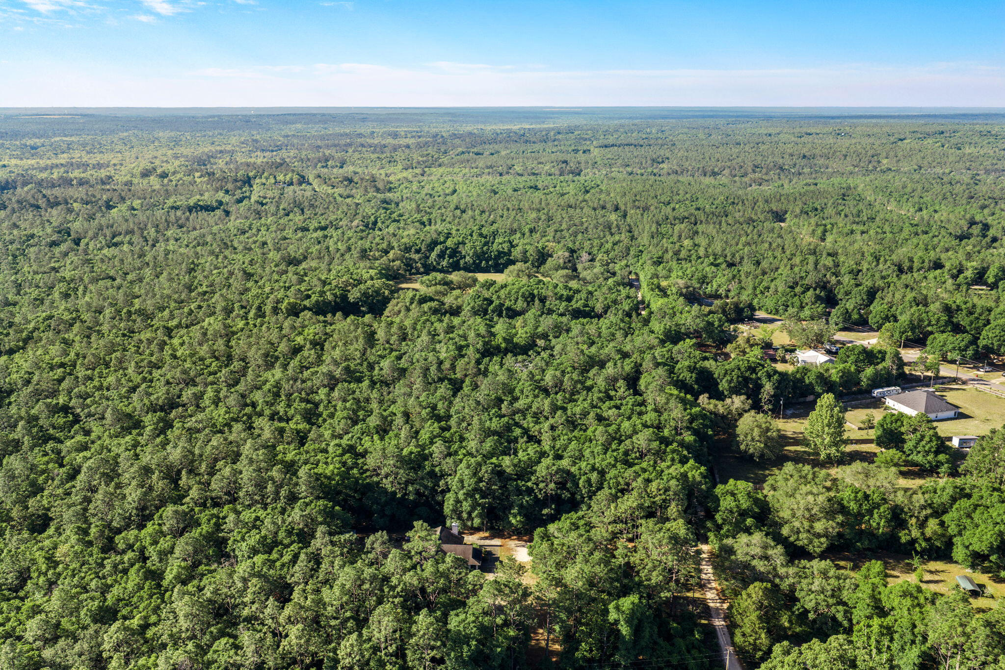5595 Sam O'Neal Road Baker, FL 32531 - Photo 5 of 15 an aerial view of forest
