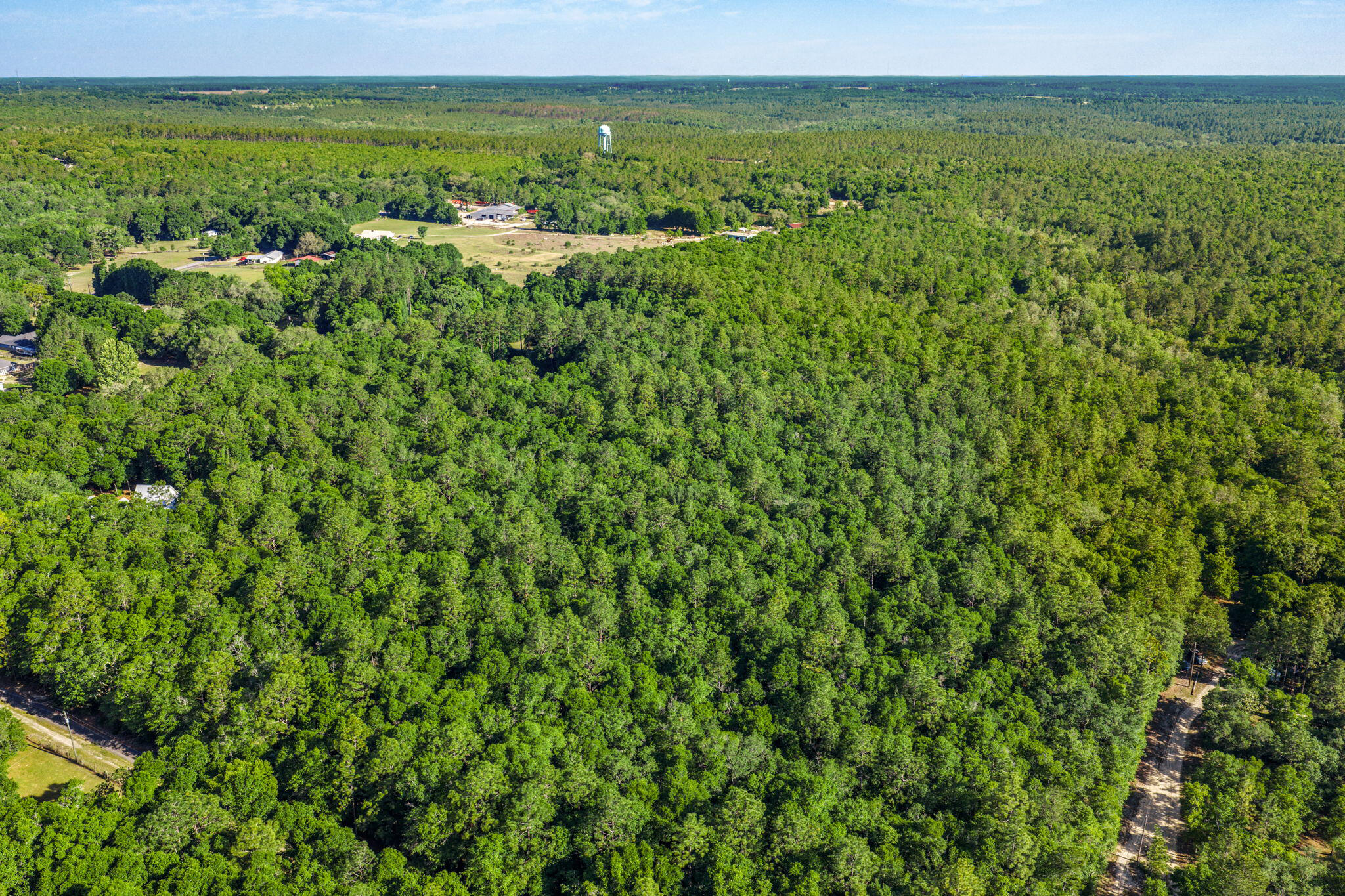 5595 Sam O'Neal Road Baker, FL 32531 - Photo 10 of 15 a view of lake with houses