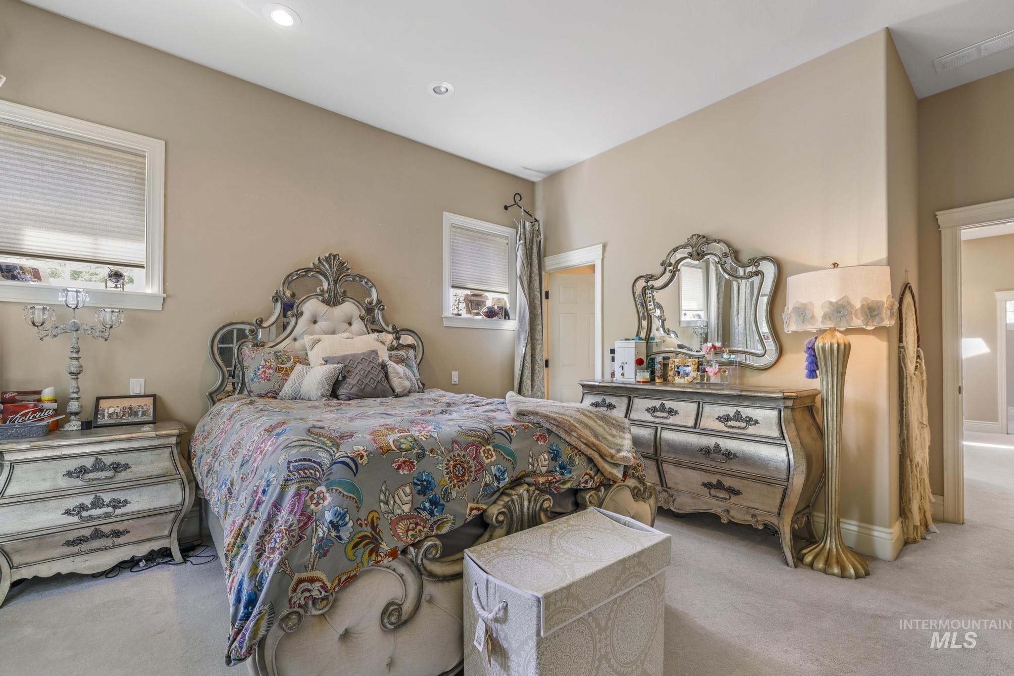 1526 Highway 26 Gooding, ID 83330 - Photo 22 of 48 Bedroom with carpet flooring, multiple windows, and recessed lighting