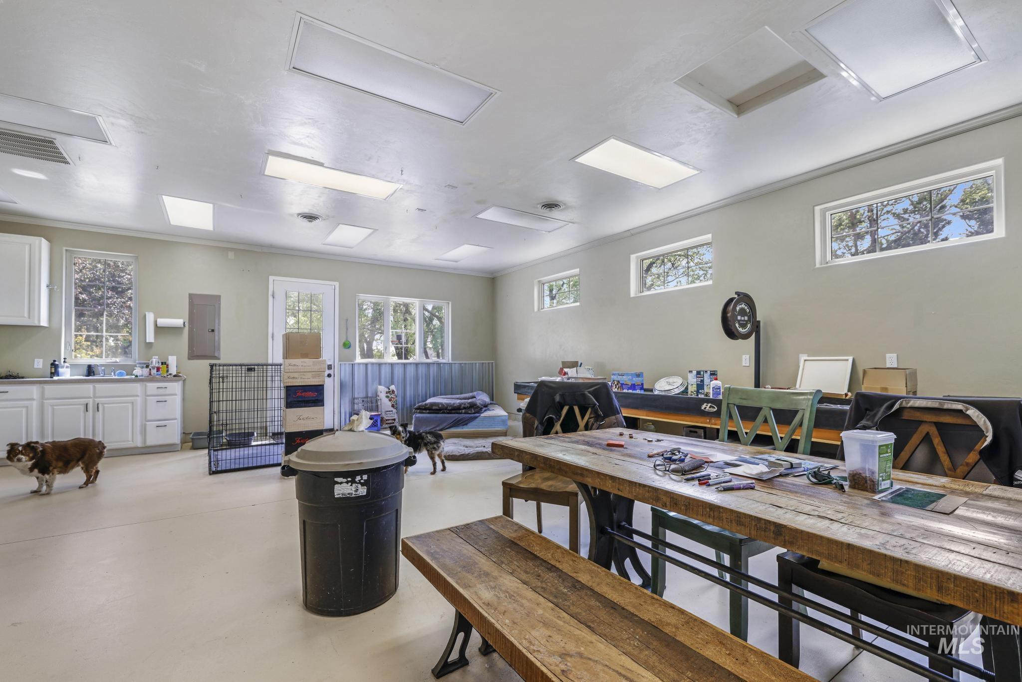 1526 Highway 26 Gooding, ID 83330 - Photo 34 of 48 Office with concrete flooring, healthy amount of natural light, and electric panel
