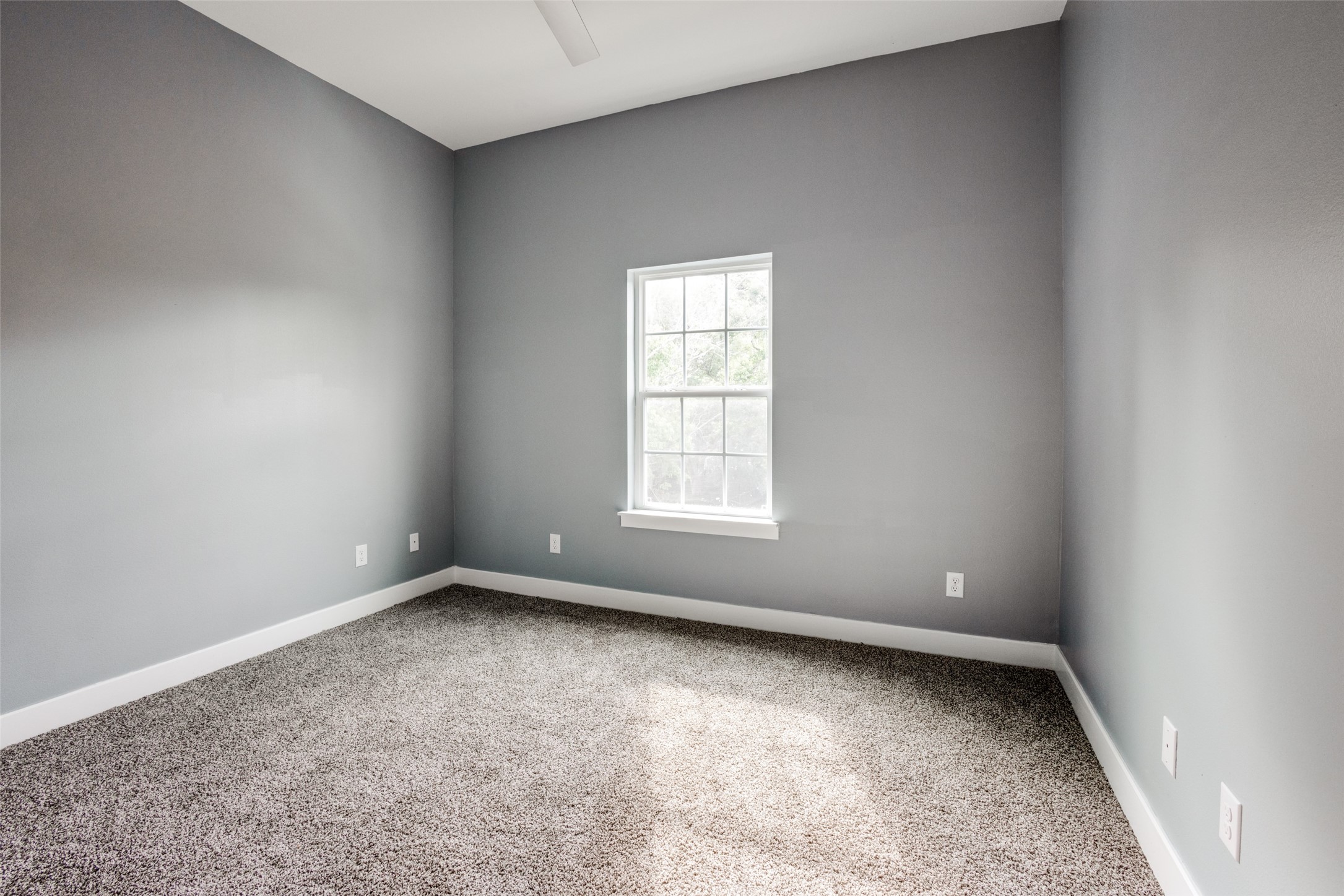 4927 East Ridge Creek Drive Houston, TX 77053 - Photo 15 of 25 an empty room with a window