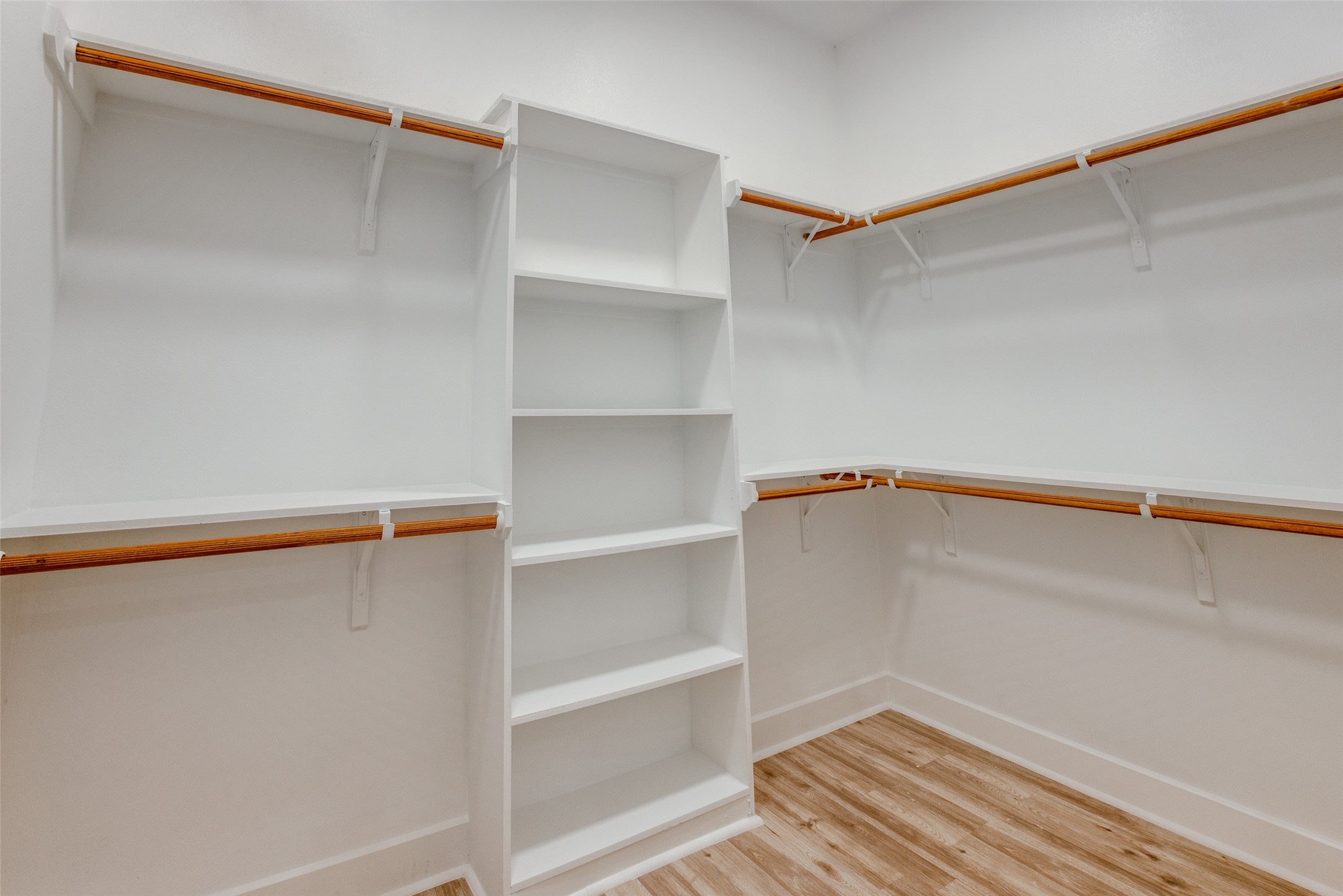 4927 East Ridge Creek Drive Houston, TX 77053 - Photo 23 of 25 a view of an empty walk in closet