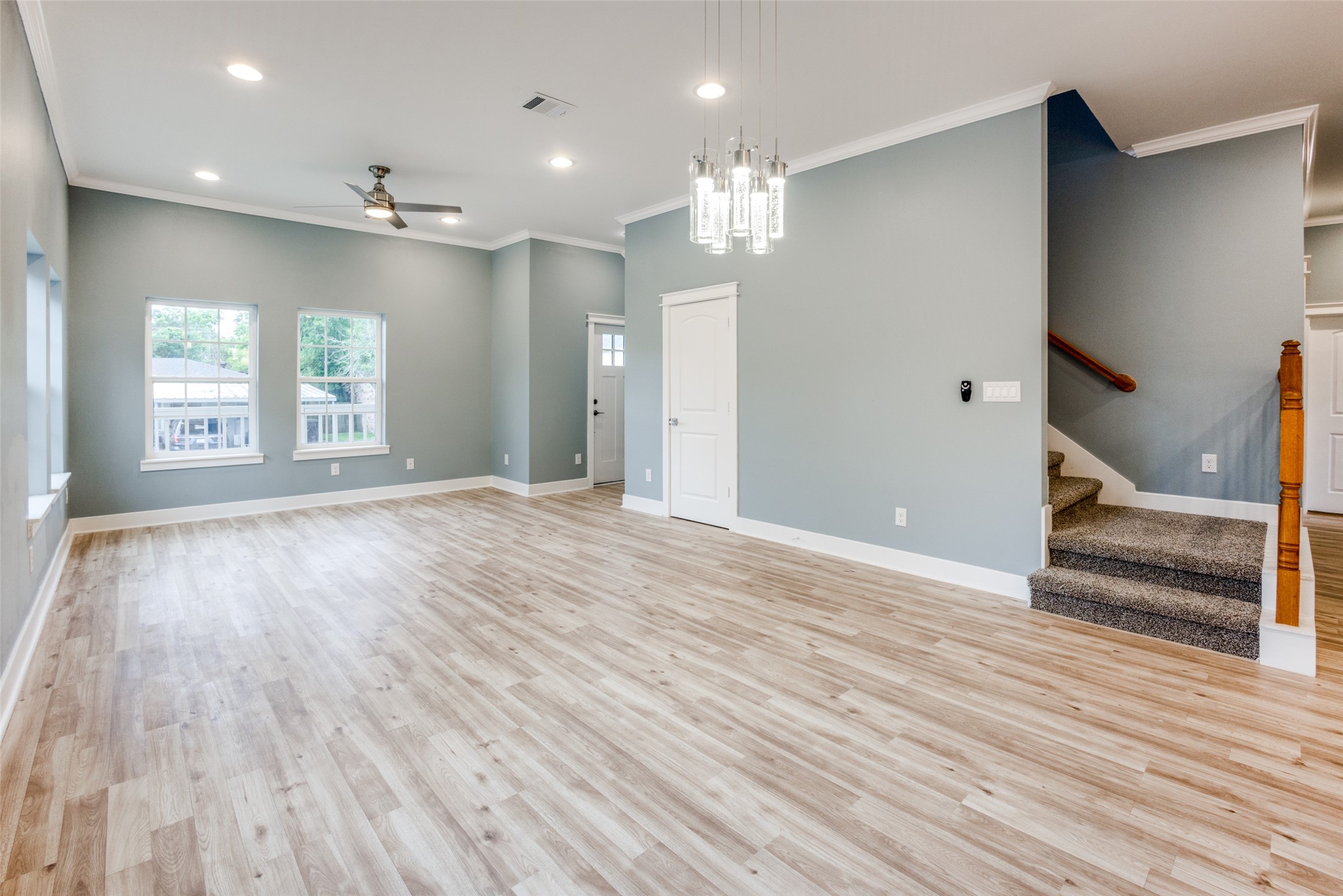 4927 East Ridge Creek Drive Houston, TX 77053 - Photo 5 of 25 a view of an empty room with wooden floor and a window