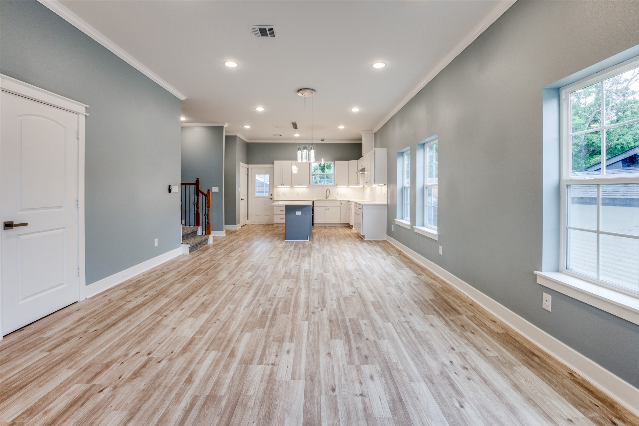 4927 East Ridge Creek Drive Houston, TX 77053 - Photo 6 of 25 a view of a kitchen with wooden floor and a window