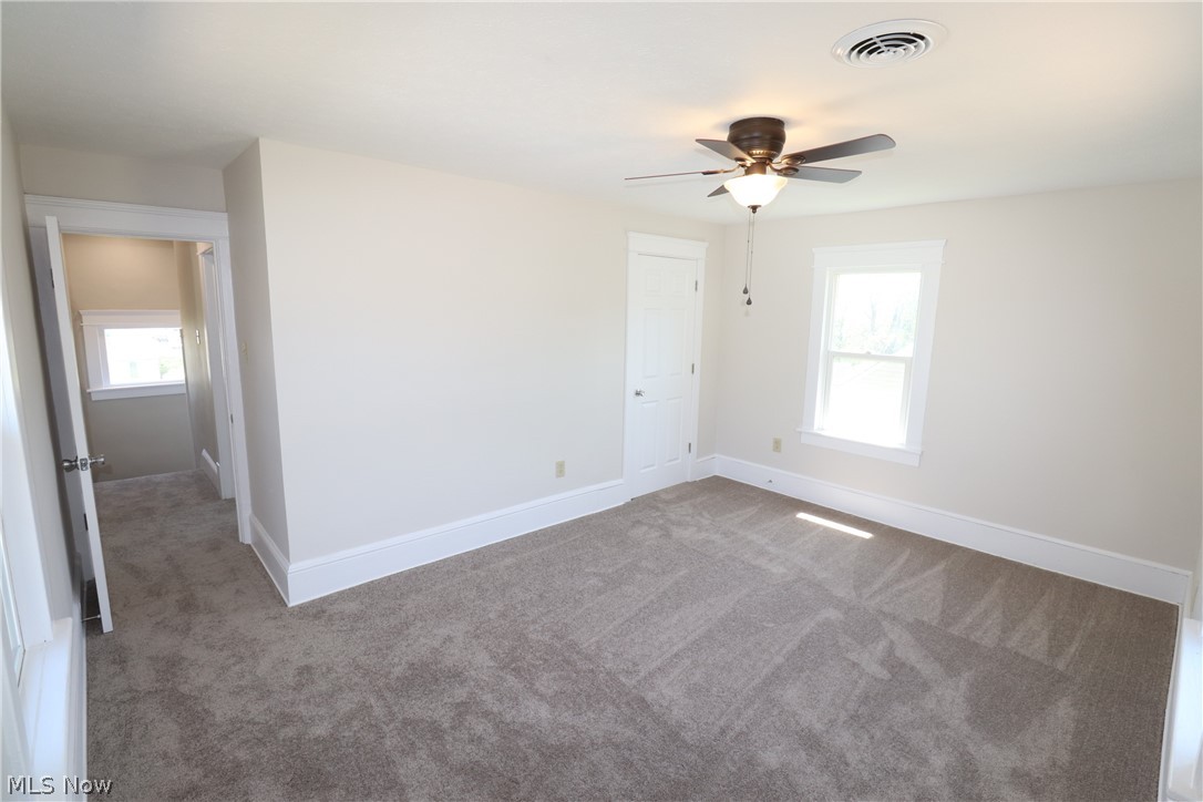 38 South State Street Rittman, OH 44270 - Photo 13 of 17 second floor. New paint, ceiling fan, carpet, door