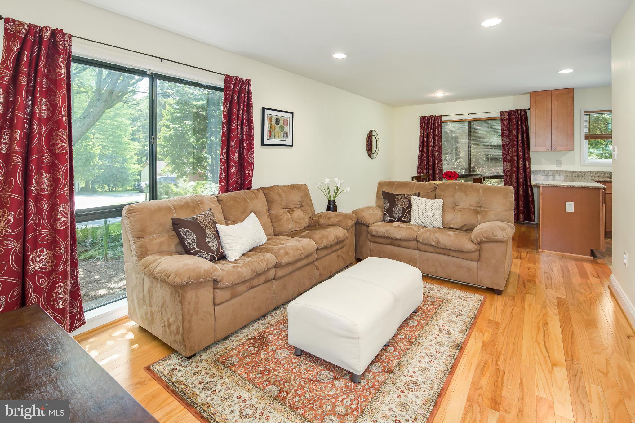 2309 November Lane Reston, VA 20191 - Photo 13 of 29 a living room with furniture and a large window