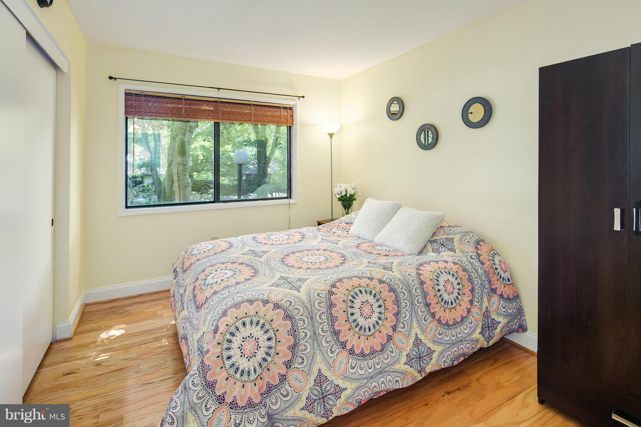 2309 November Lane Reston, VA 20191 - Photo 18 of 29 a bedroom with a bed and a window