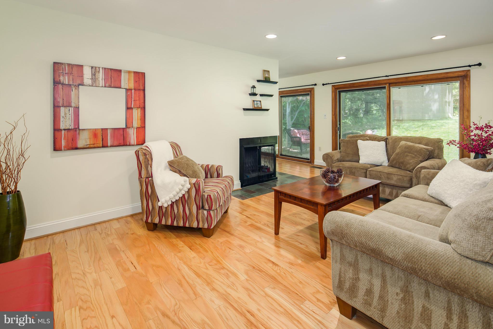 2309 November Lane Reston, VA 20191 - Photo 4 of 29 a living room with furniture and a large window
