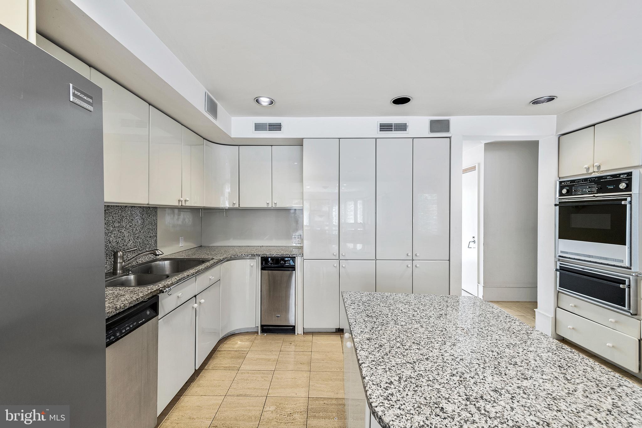 655 Matsonford Road Villanova, PA 19085 - Photo 24 of 63 a kitchen with a sink cabinets and stainless steel appliances