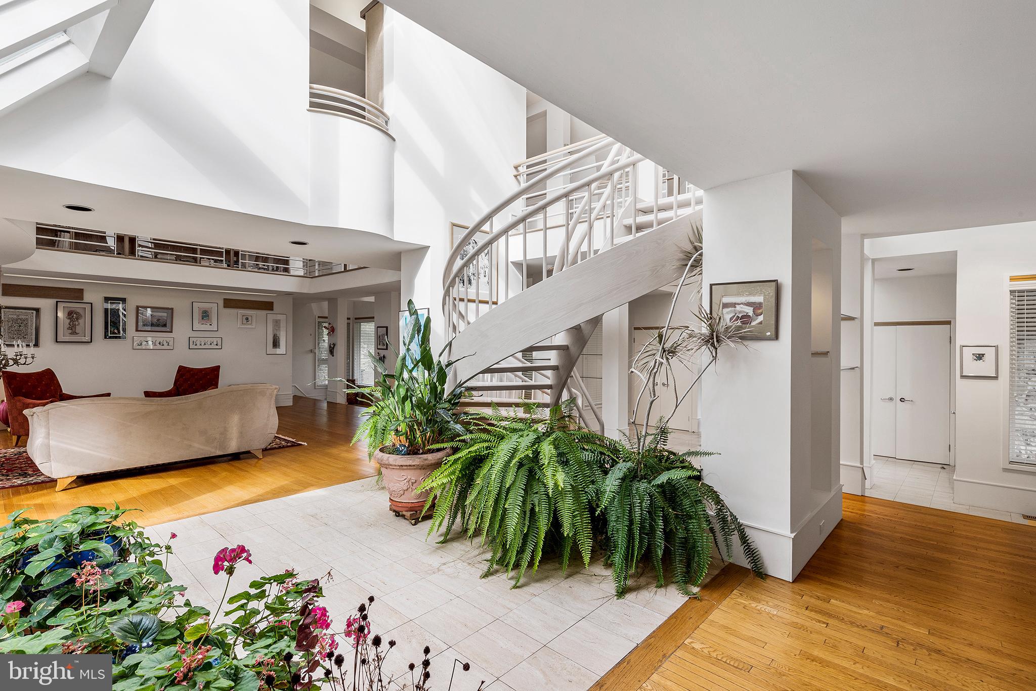 655 Matsonford Road Villanova, PA 19085 - Photo 32 of 63 a view of entryway and hall with wooden floor