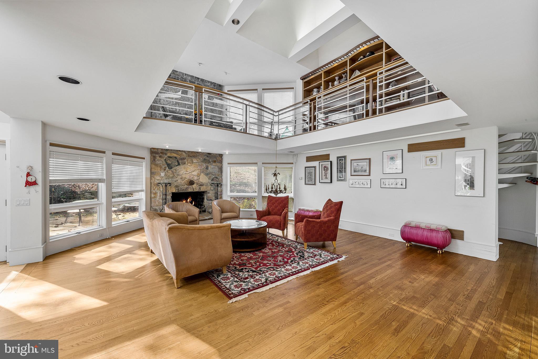 655 Matsonford Road Villanova, PA 19085 - Photo 34 of 63 a living room with furniture and a flat screen tv