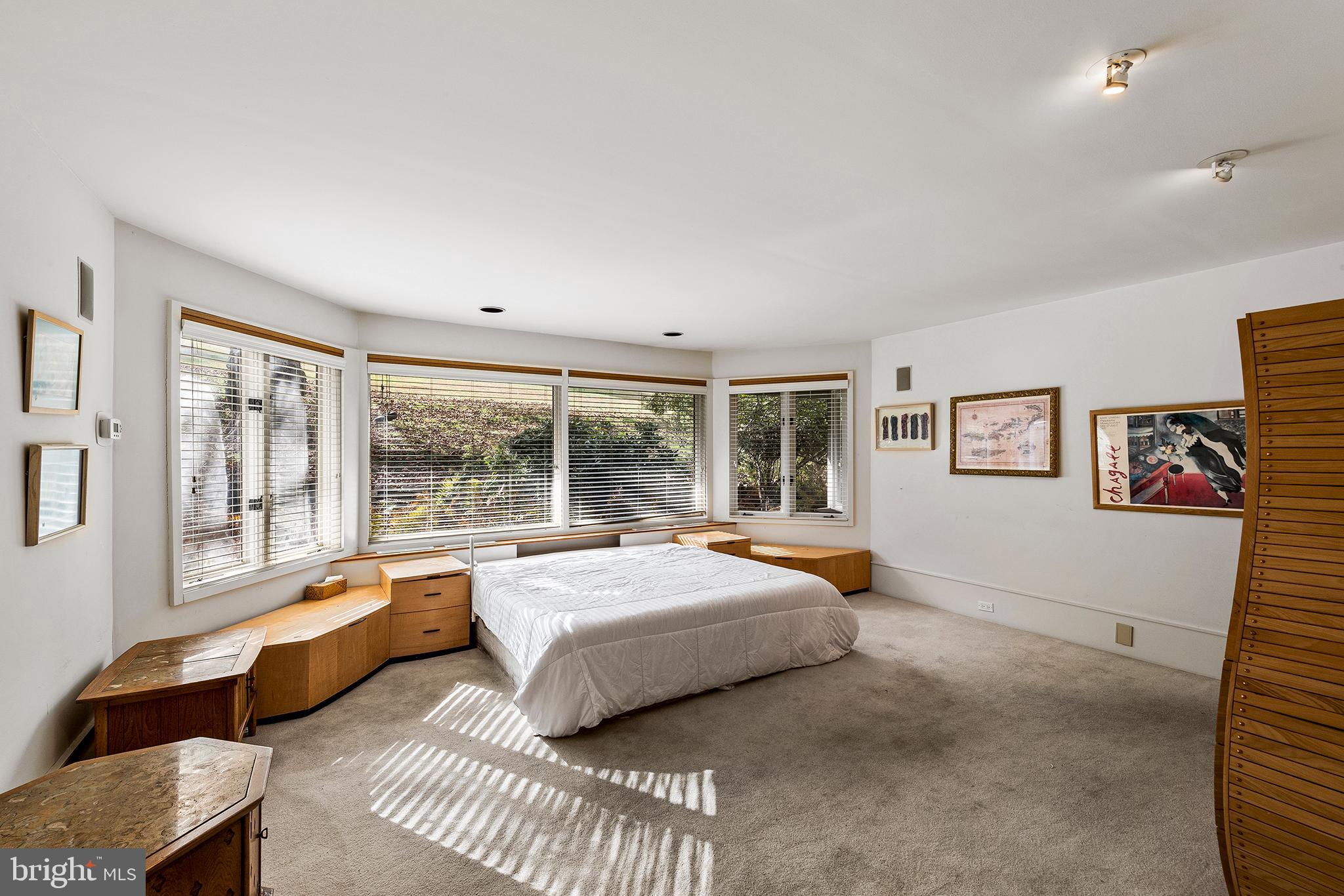 655 Matsonford Road Villanova, PA 19085 - Photo 40 of 63 a bedroom with furniture and a large window