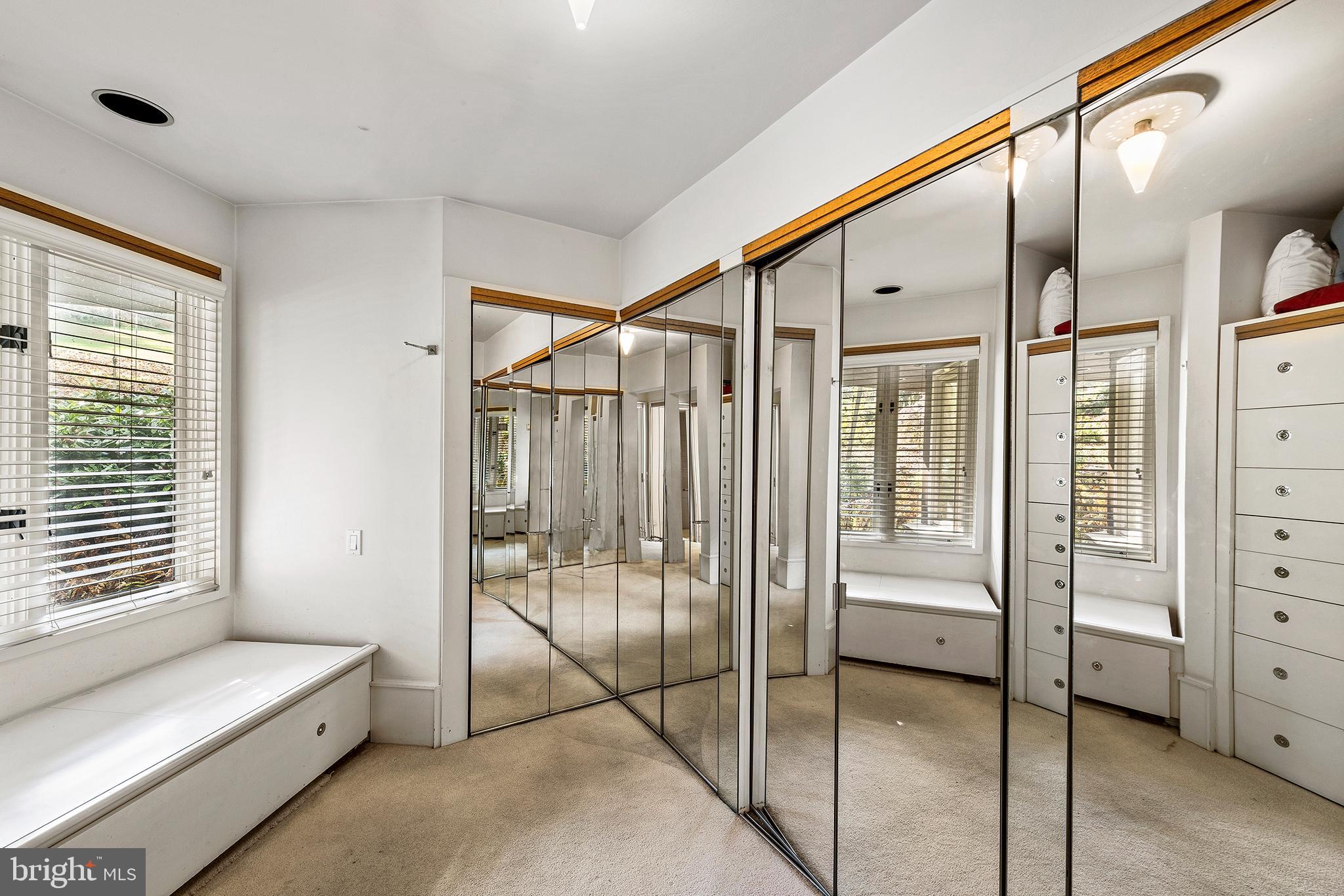 655 Matsonford Road Villanova, PA 19085 - Photo 41 of 63 a bathroom with a glass door shower and a sink