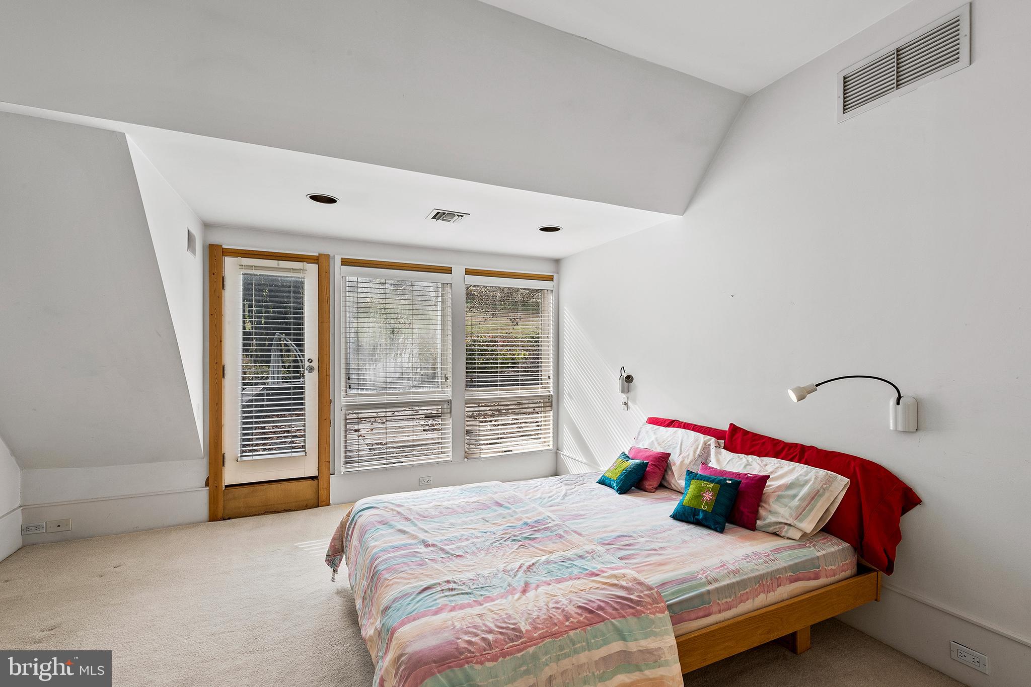 655 Matsonford Road Villanova, PA 19085 - Photo 57 of 63 a bedroom with a bed and a large window