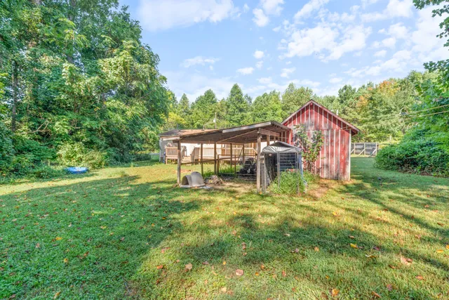 a house with swimming pool in front of it