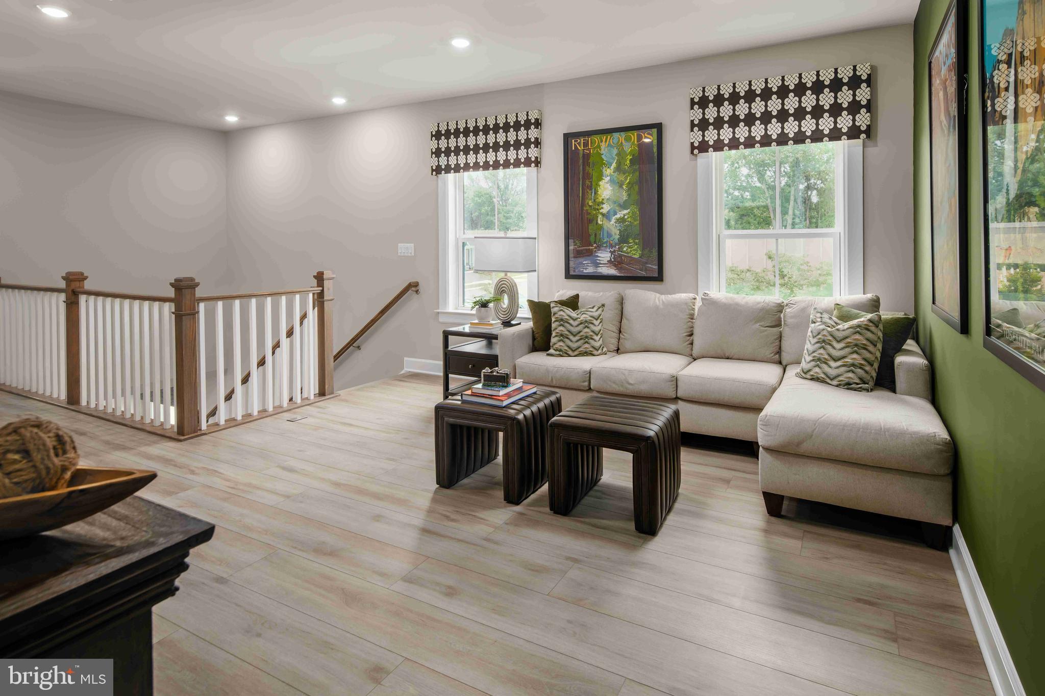 9676 Wishing Well Lane Ellicott City, MD 21042 - Photo 11 of 25 a living room with furniture and a large window