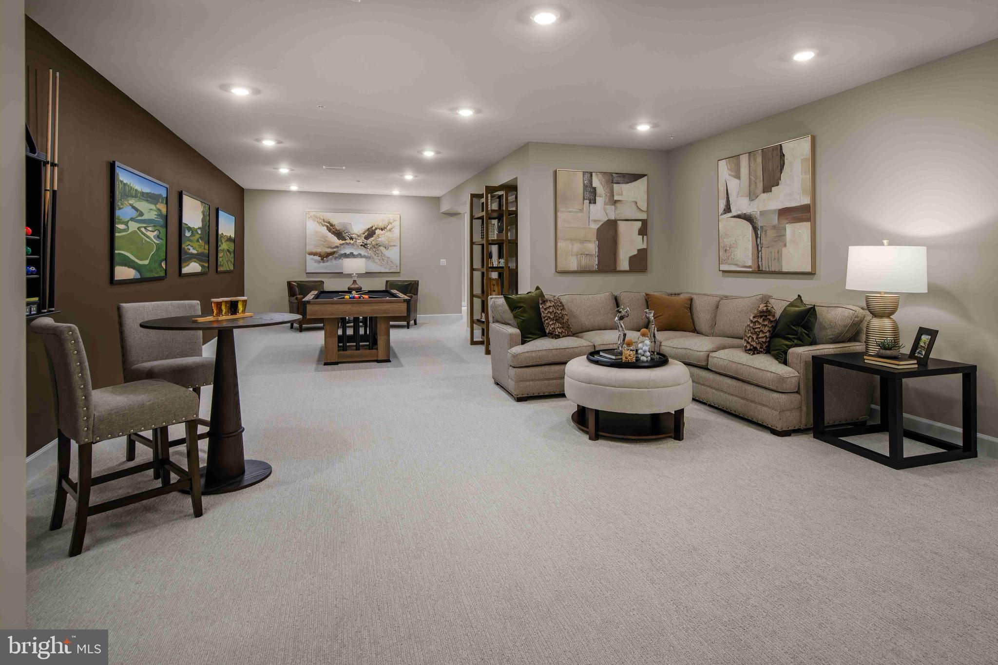 9676 Wishing Well Lane Ellicott City, MD 21042 - Photo 14 of 25 a living room with furniture and a flat screen tv