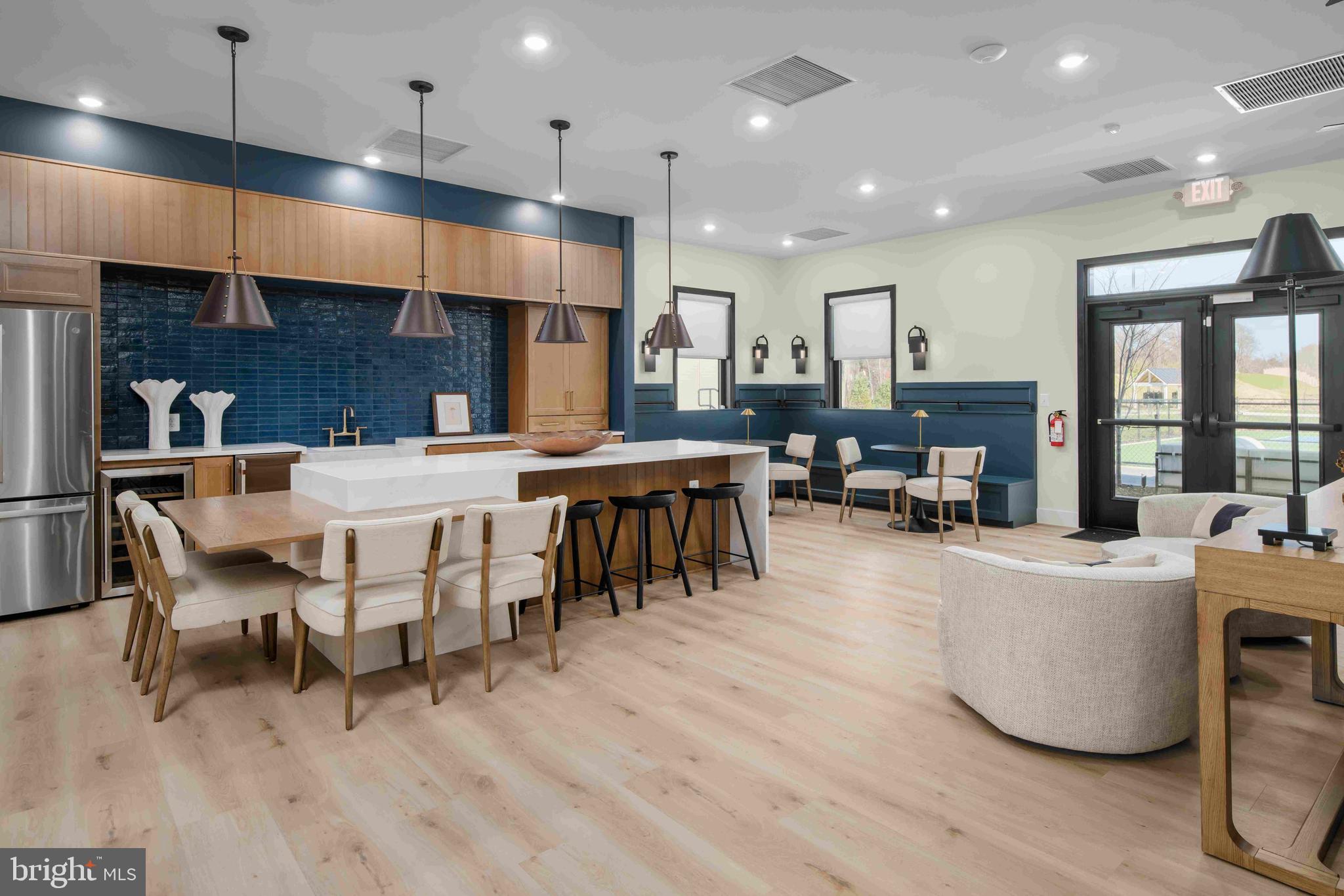 9676 Wishing Well Lane Ellicott City, MD 21042 - Photo 20 of 25 a large kitchen with a table and chairs