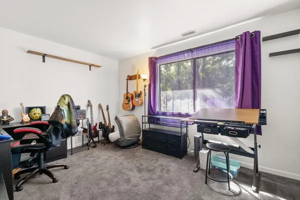 a room with furniture and a window
