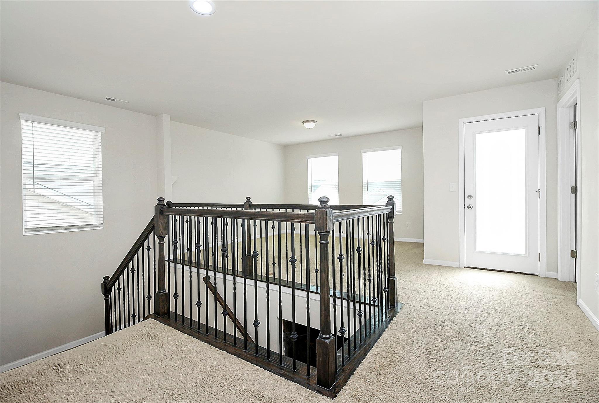 1769 Bailey Ridge Drive York, SC 29745 - Photo 25 of 47 a view of a hallway view with windows