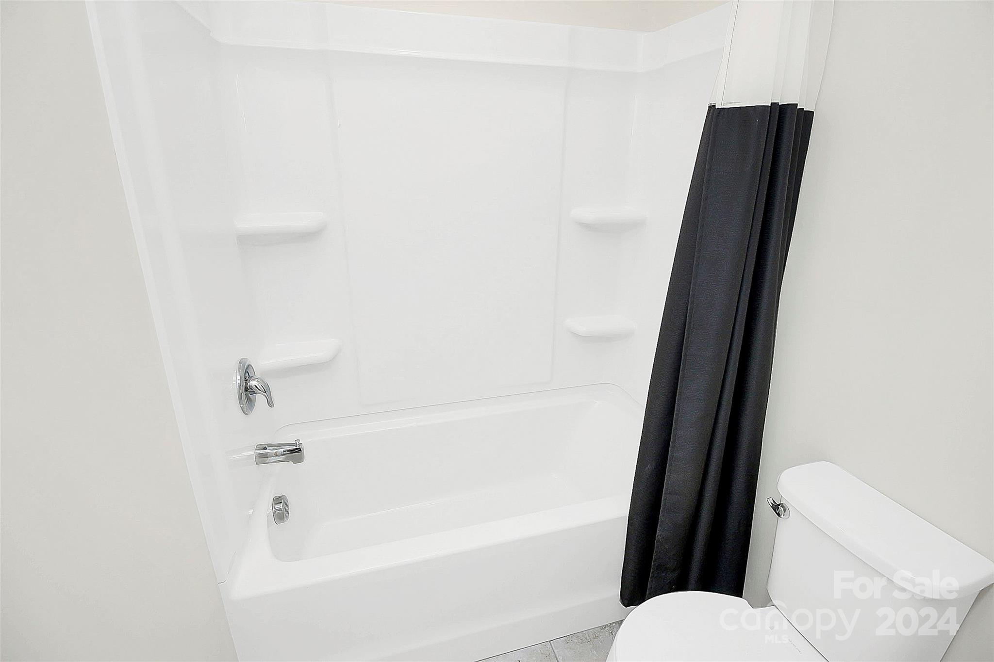 1769 Bailey Ridge Drive York, SC 29745 - Photo 32 of 47 a bathroom with a shower and a toilet
