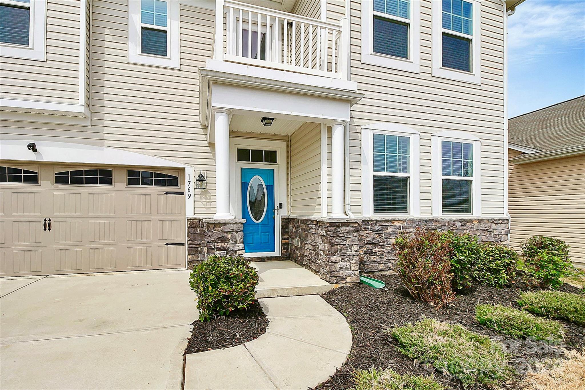 1769 Bailey Ridge Drive York, SC 29745 - Photo 42 of 47 a house with a potted plant