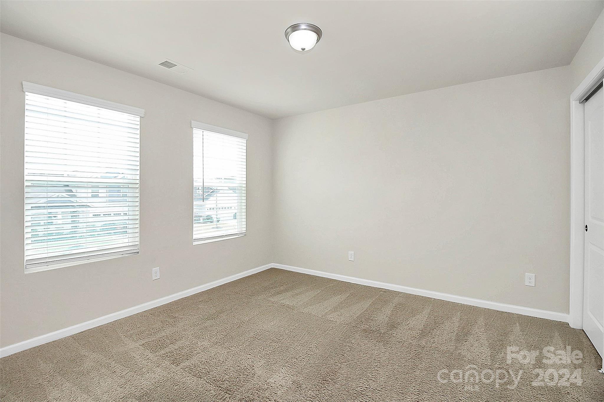 1769 Bailey Ridge Drive York, SC 29745 - Photo 7 of 47 a big room with windows and closet