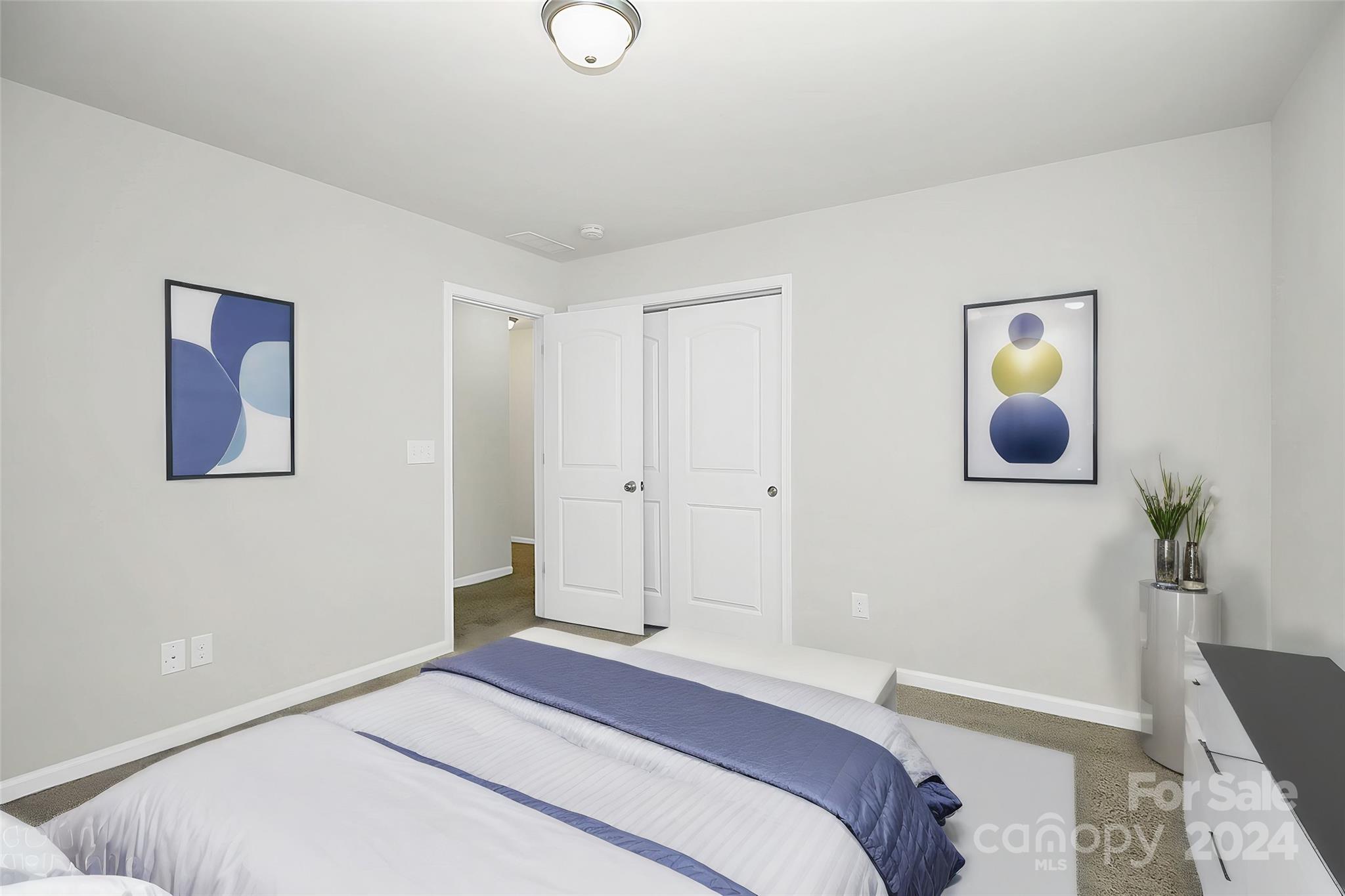 1769 Bailey Ridge Drive York, SC 29745 - Photo 9 of 47 a bedroom with a bed and a painting on the wall