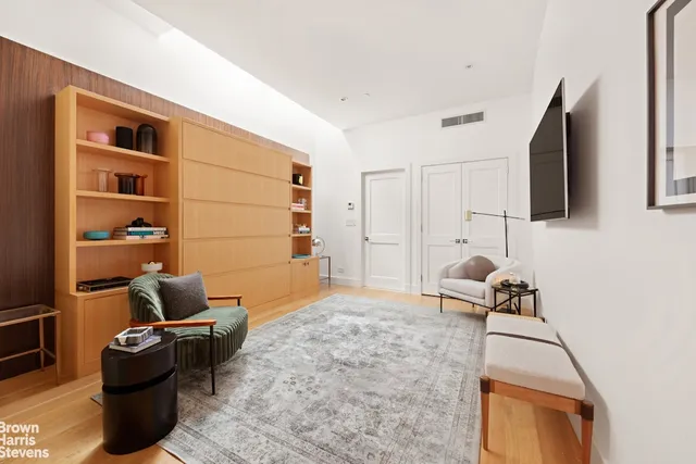 a bedroom with furniture and a couch