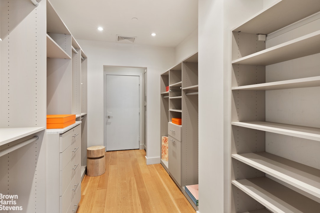 7 East 17th Street, Unit PHS Manhattan, NY 10003 - Photo 17 of 26 a view of hallway with washer and dryer