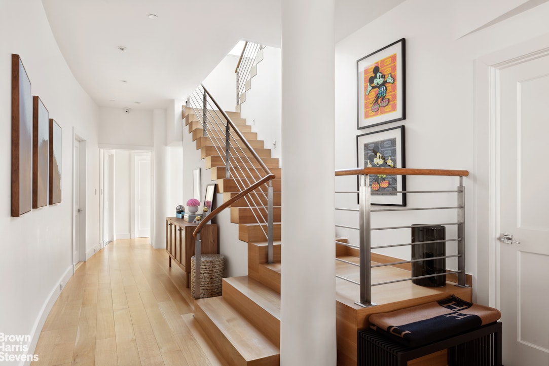 7 East 17th Street, Unit PHS Manhattan, NY 10003 - Photo 18 of 26 a view of entryway and hall with wooden floor