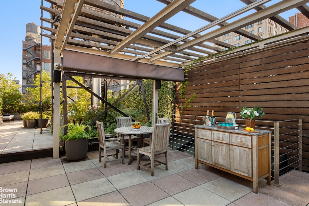 7 East 17th Street, Unit PHS Manhattan, NY 10003 - Photo 22 of 26 a view of a chairs and table in the balcony