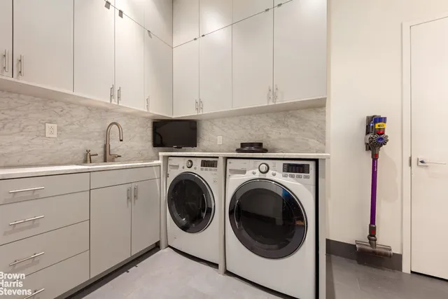 a view of a terrace with furniture and a fire pit