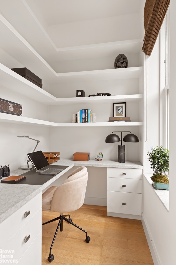 7 East 17th Street, Unit PHS Manhattan, NY 10003 - Photo 3 of 26 a workspace with furniture and window