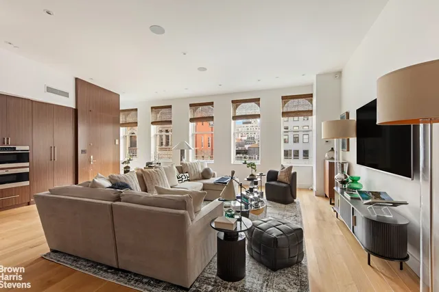 a view of a living room with furniture